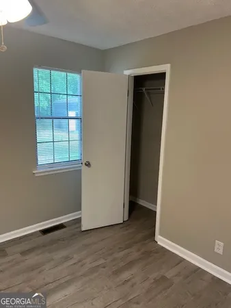 a bathroom with a toilet and a bathtub