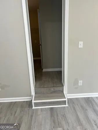 a bathroom with a toilet and a sink