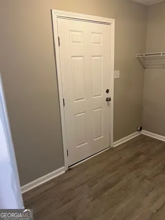 a view of a livingroom with a window