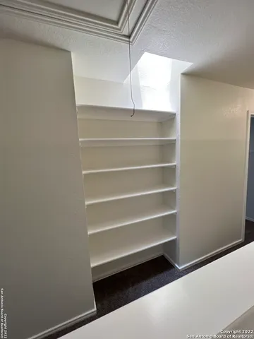 a kitchen with stainless steel appliances granite countertop a sink and a stove