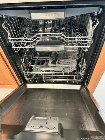 a view of a back yard from a room