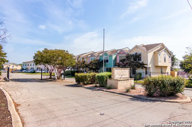 a view of a street with houses