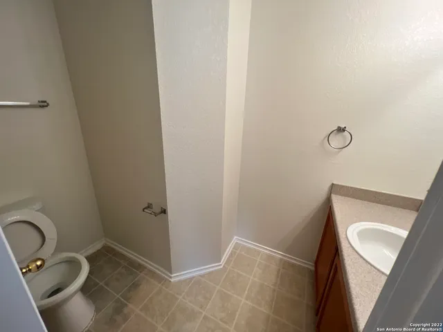 a bathroom with a sink and toilet