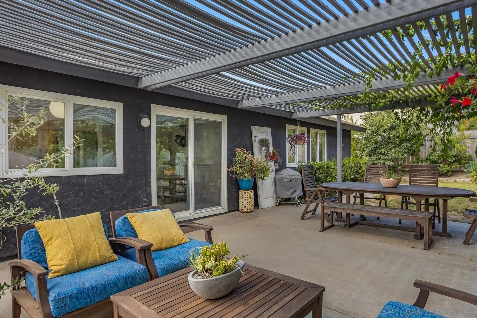 398 Compass Road Oceanside, CA 92054 - Photo 28 of 42 a outdoor living space with furniture and a potted plant