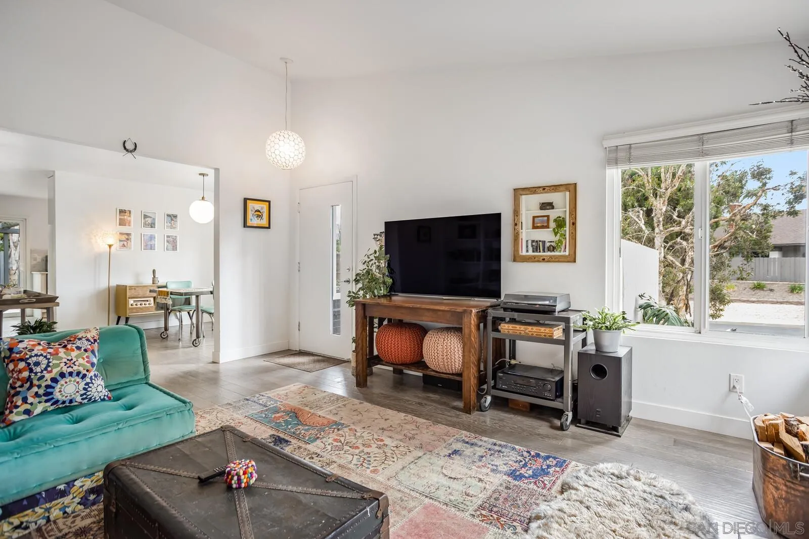 398 Compass Road Oceanside, CA 92054 - Photo 8 of 42 a living room with furniture and a flat screen tv