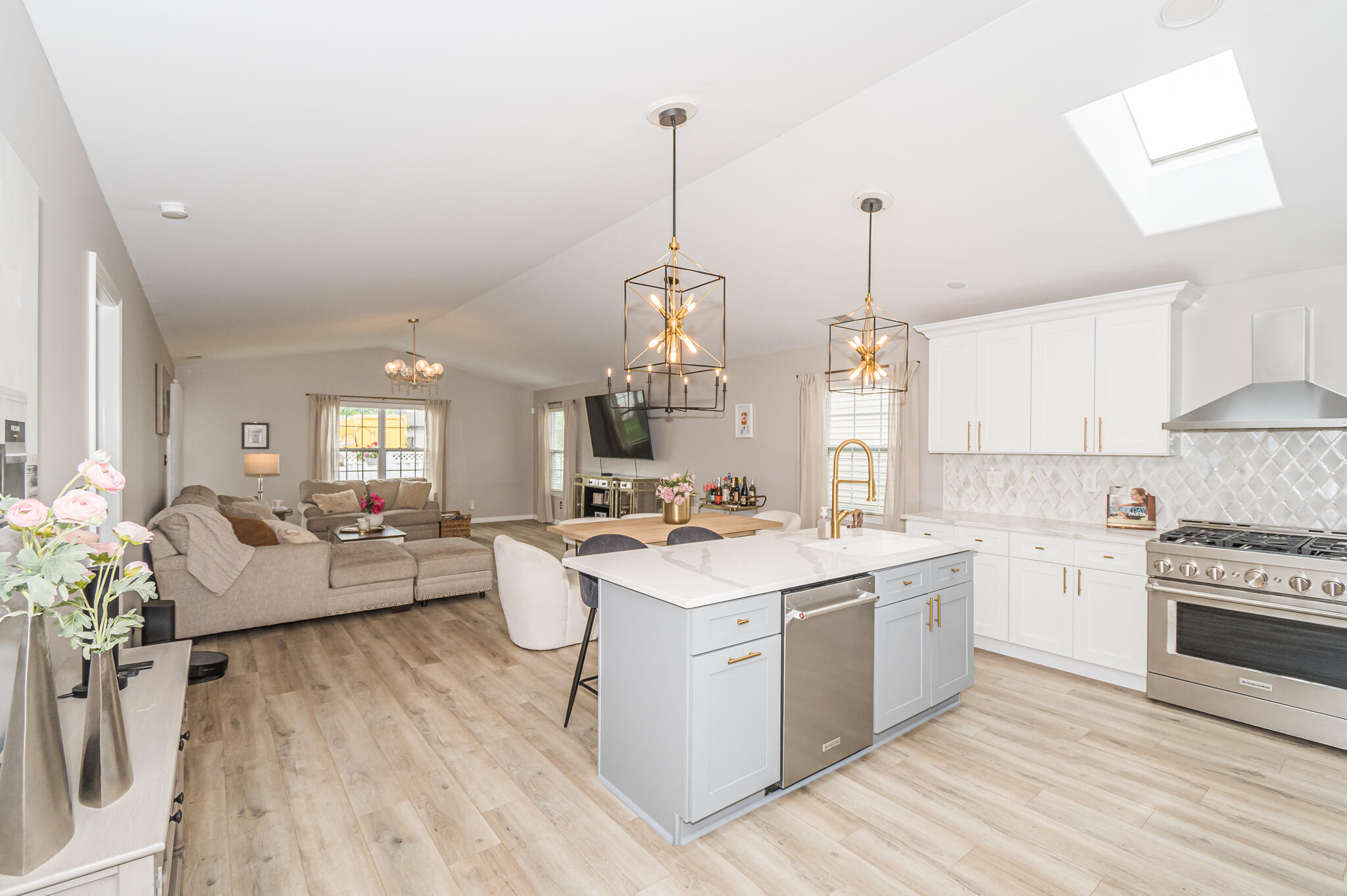 10735 Keystone Lane Crown Point, IN 46307 - Photo 7 of 23 a kitchen that has a lot of white cabinets and wooden floor