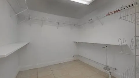 a view of a room with racks on the wall