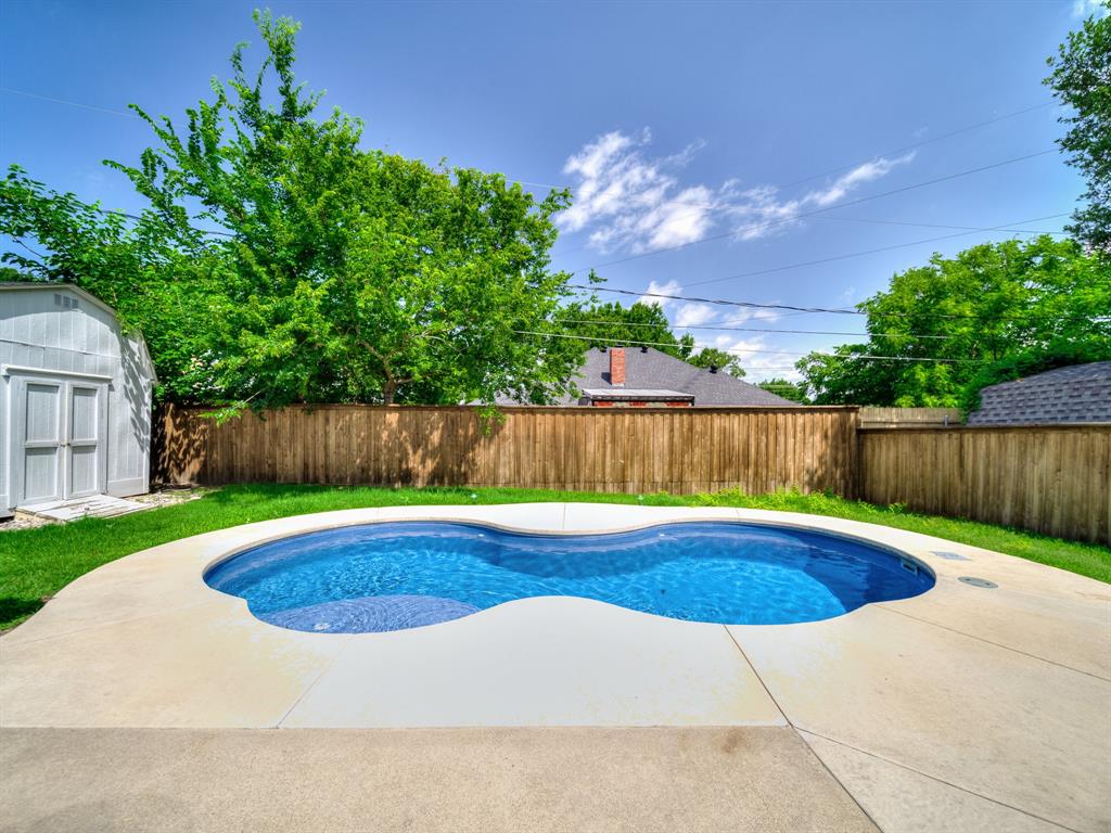 121 Northeast Brushy Mound Road Burleson, TX 76028 - Photo 34 of 35 a view of pool with a yard