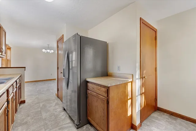 a view of a kitchen from the hallway