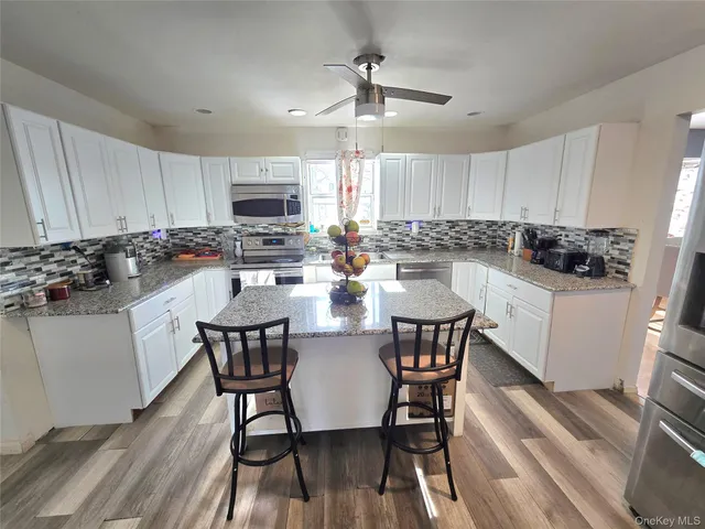 $599,000 | 70 Breston Drive East, Shirley, NY 11967