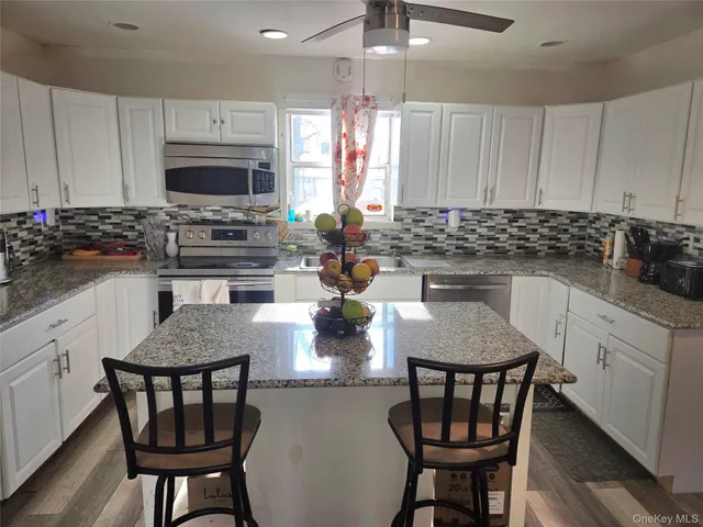 $599,000 | 70 Breston Drive East, Shirley, NY 11967