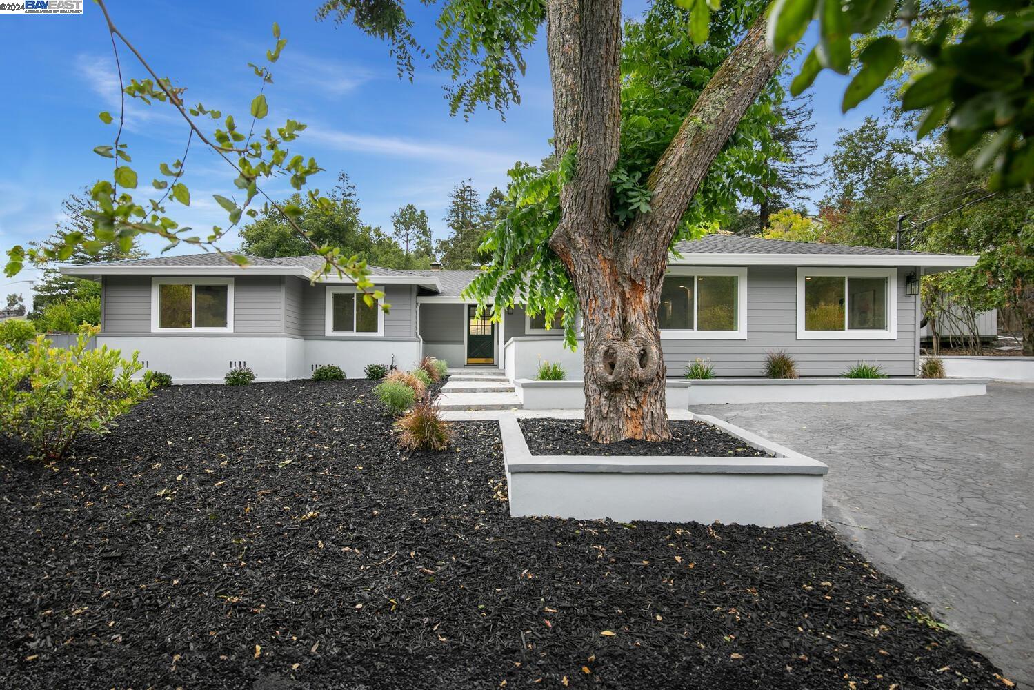 1830 Reliez Valley Road Lafayette, CA 94549 - Photo 1 of 1 a front view of a house with a yard
