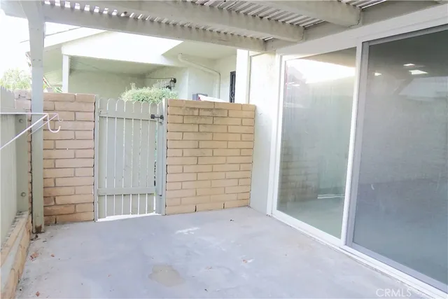 a view of empty room with a bathroom