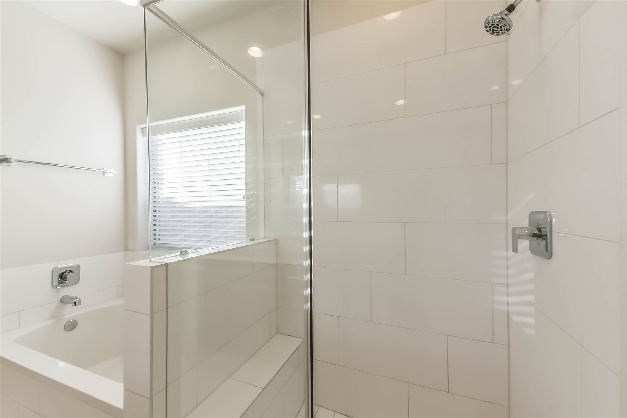 3206 North MacGregor Way, Unit A Houston, TX 77004 - Photo 12 of 30 a bathroom with a bathtub and a shower