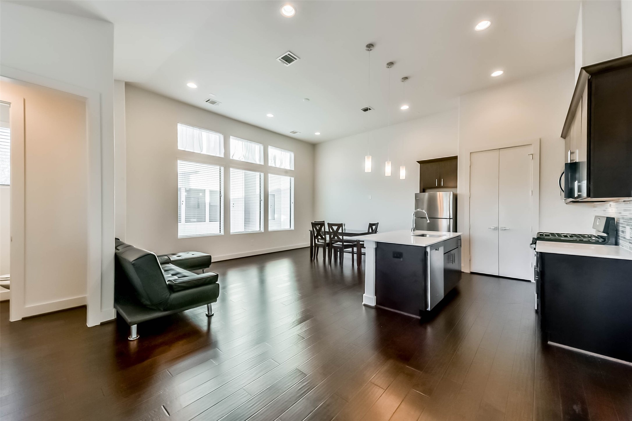3206 North MacGregor Way, Unit A Houston, TX 77004 - Photo 15 of 30 a living room with furniture and a flat screen tv
