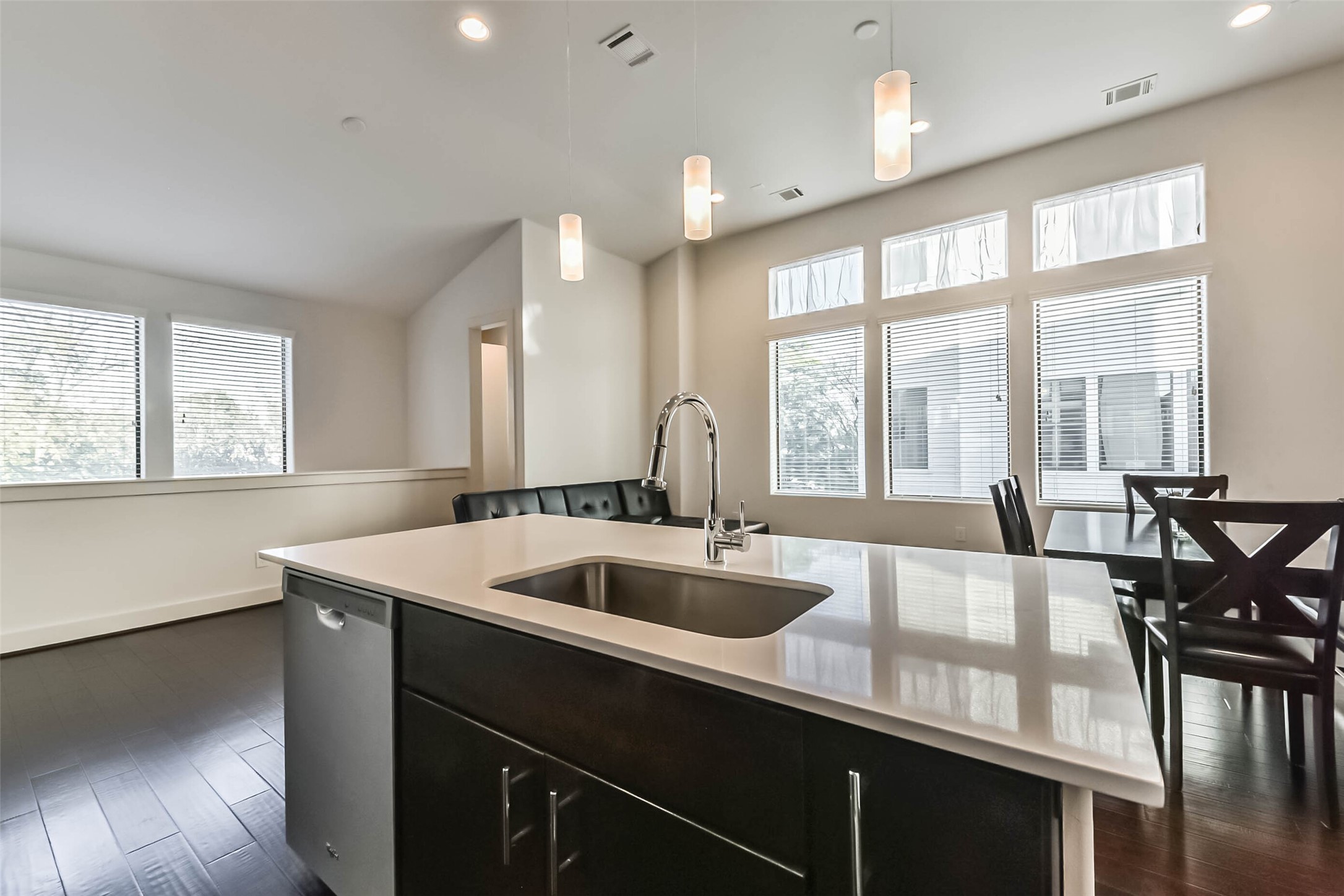 3206 North MacGregor Way, Unit A Houston, TX 77004 - Photo 19 of 30 a kitchen with a sink and wooden floor
