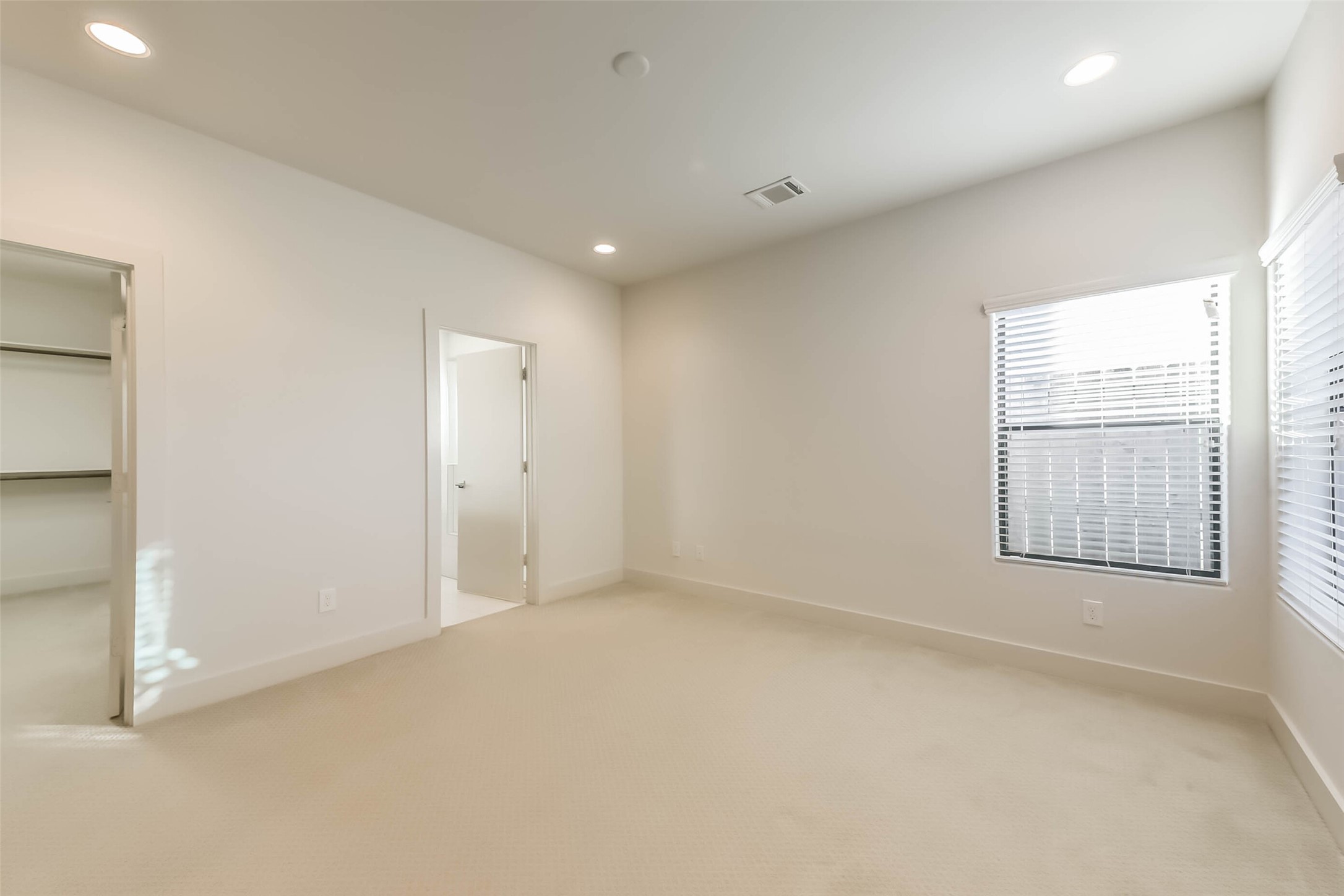 3206 North MacGregor Way, Unit A Houston, TX 77004 - Photo 7 of 30 an empty room with windows