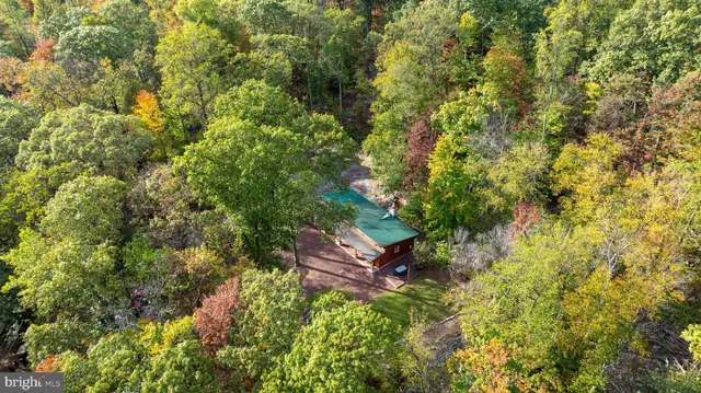 a kitchen with a stove and a fireplace
