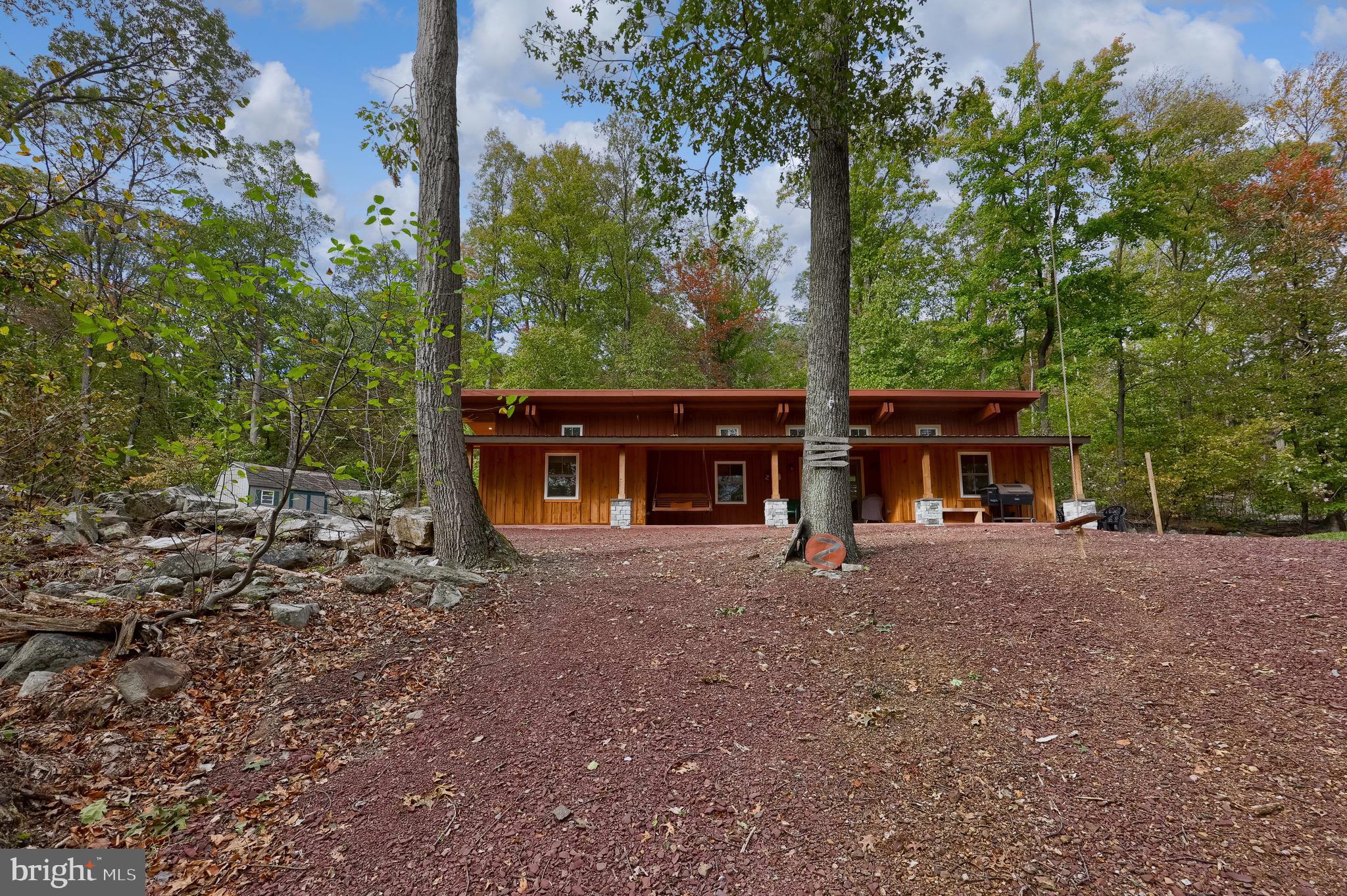 485 Airport Road Bethel, PA 19507 - Photo 12 of 71 a view of a house with a backyard and tree