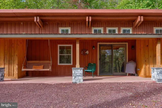 a kitchen with granite countertop a sink and a window