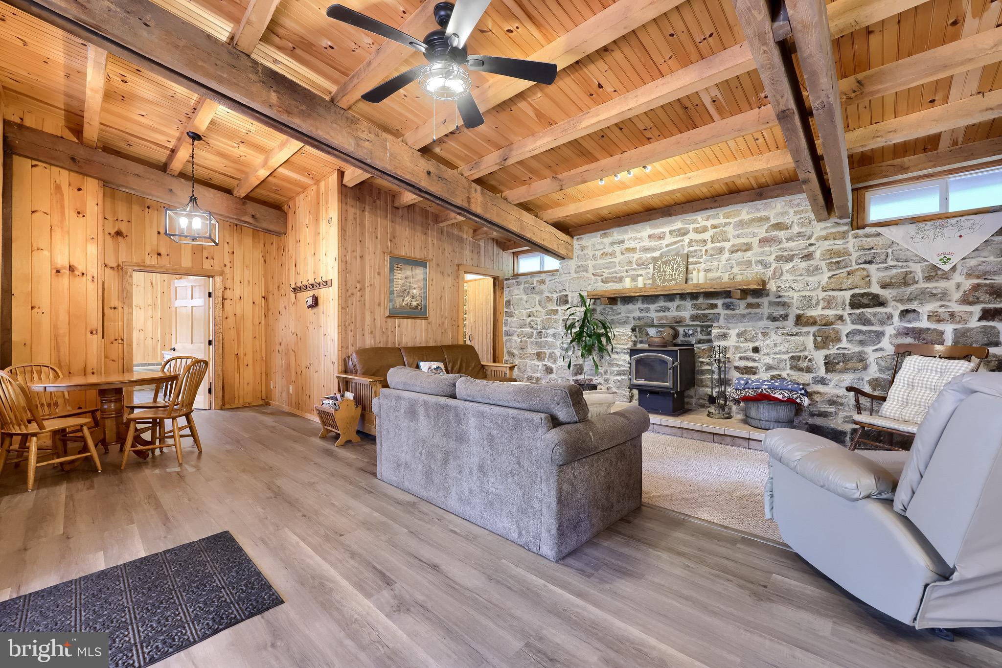 485 Airport Road Bethel, PA 19507 - Photo 18 of 71 a living room with furniture and a fireplace