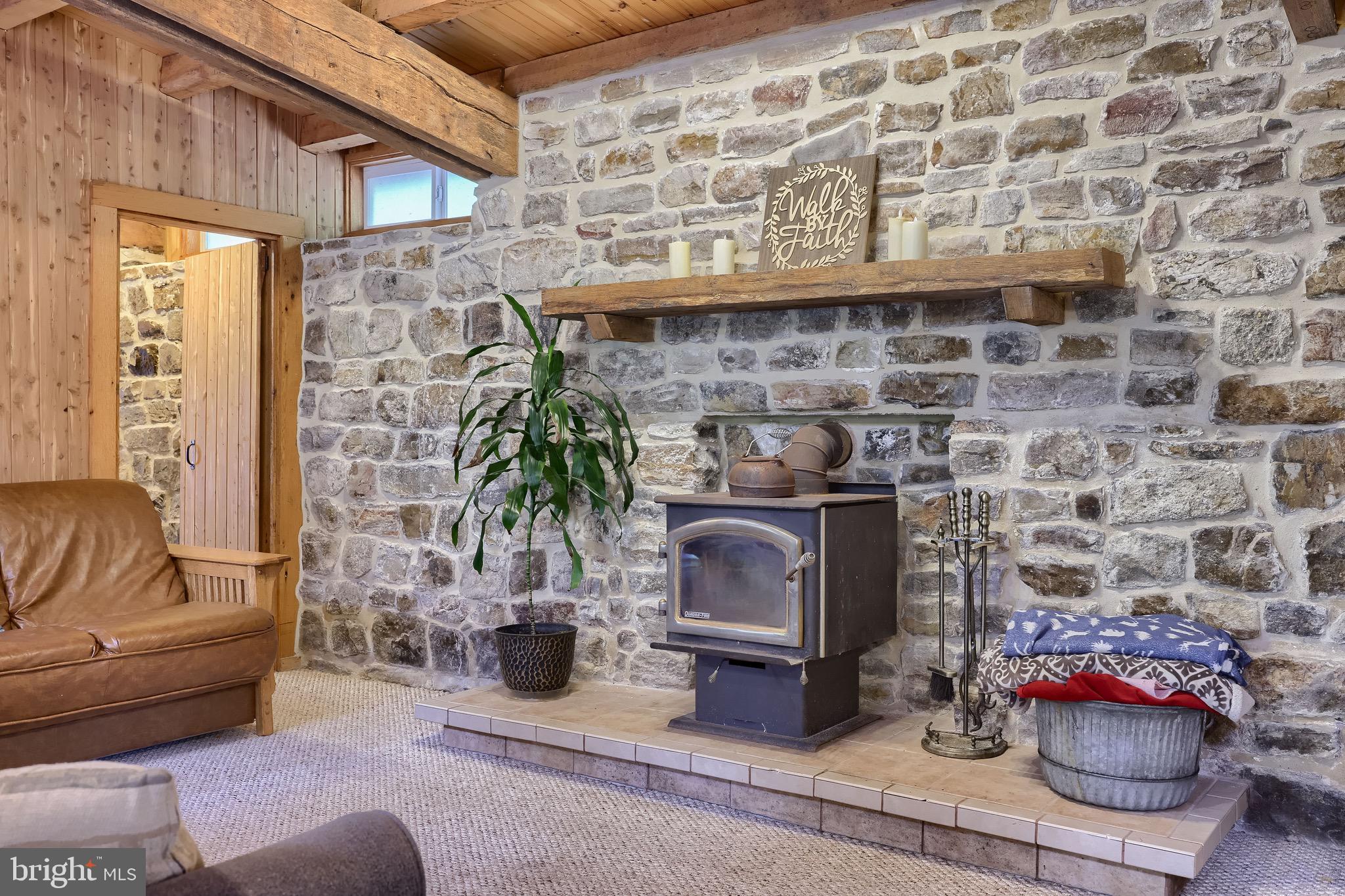 485 Airport Road Bethel, PA 19507 - Photo 19 of 71 a living room with furniture and a fireplace