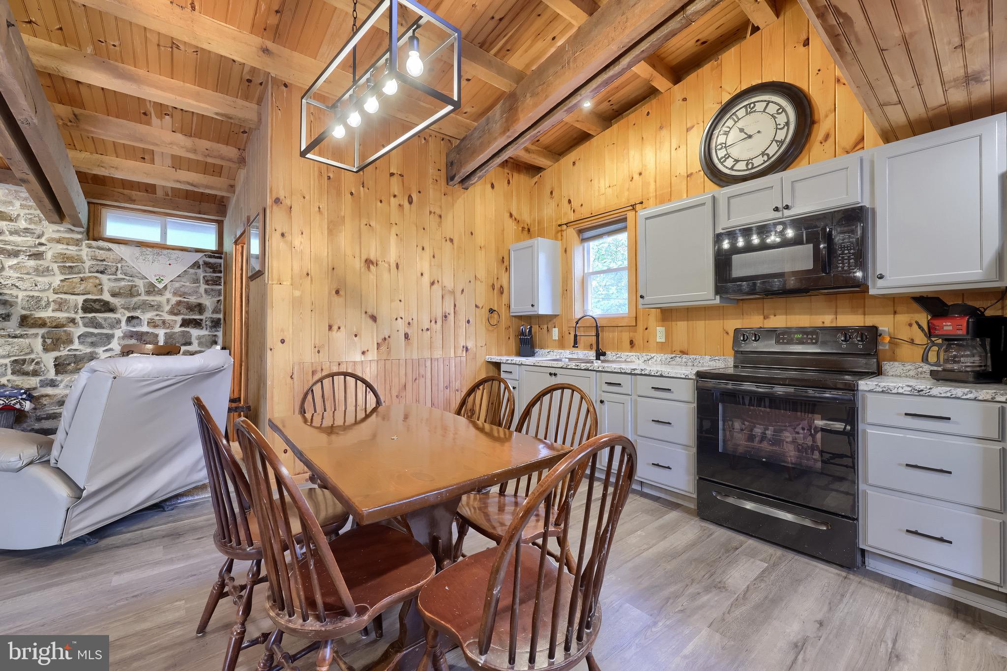 485 Airport Road Bethel, PA 19507 - Photo 23 of 71 a view of a kitchen with a table and chairs