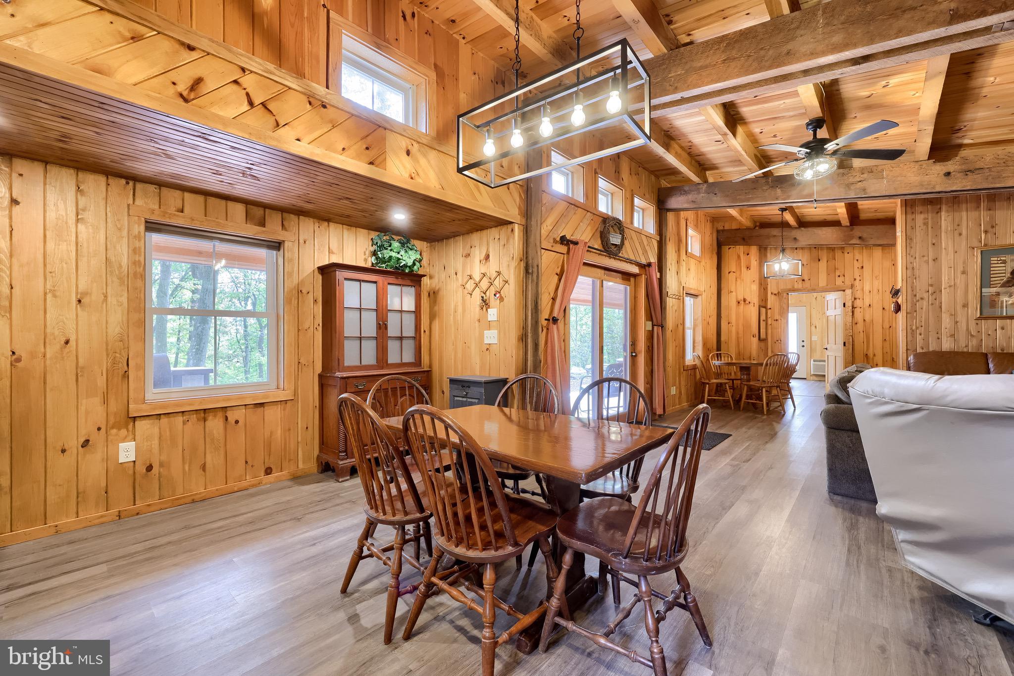 485 Airport Road Bethel, PA 19507 - Photo 25 of 71 a view of a dining room with furniture and wooden floor