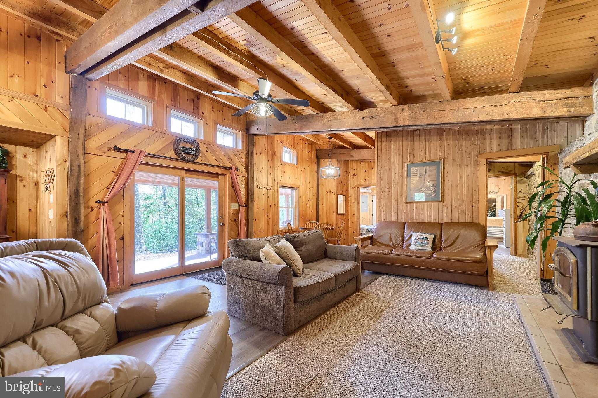 485 Airport Road Bethel, PA 19507 - Photo 26 of 71 a living room with furniture and a large window