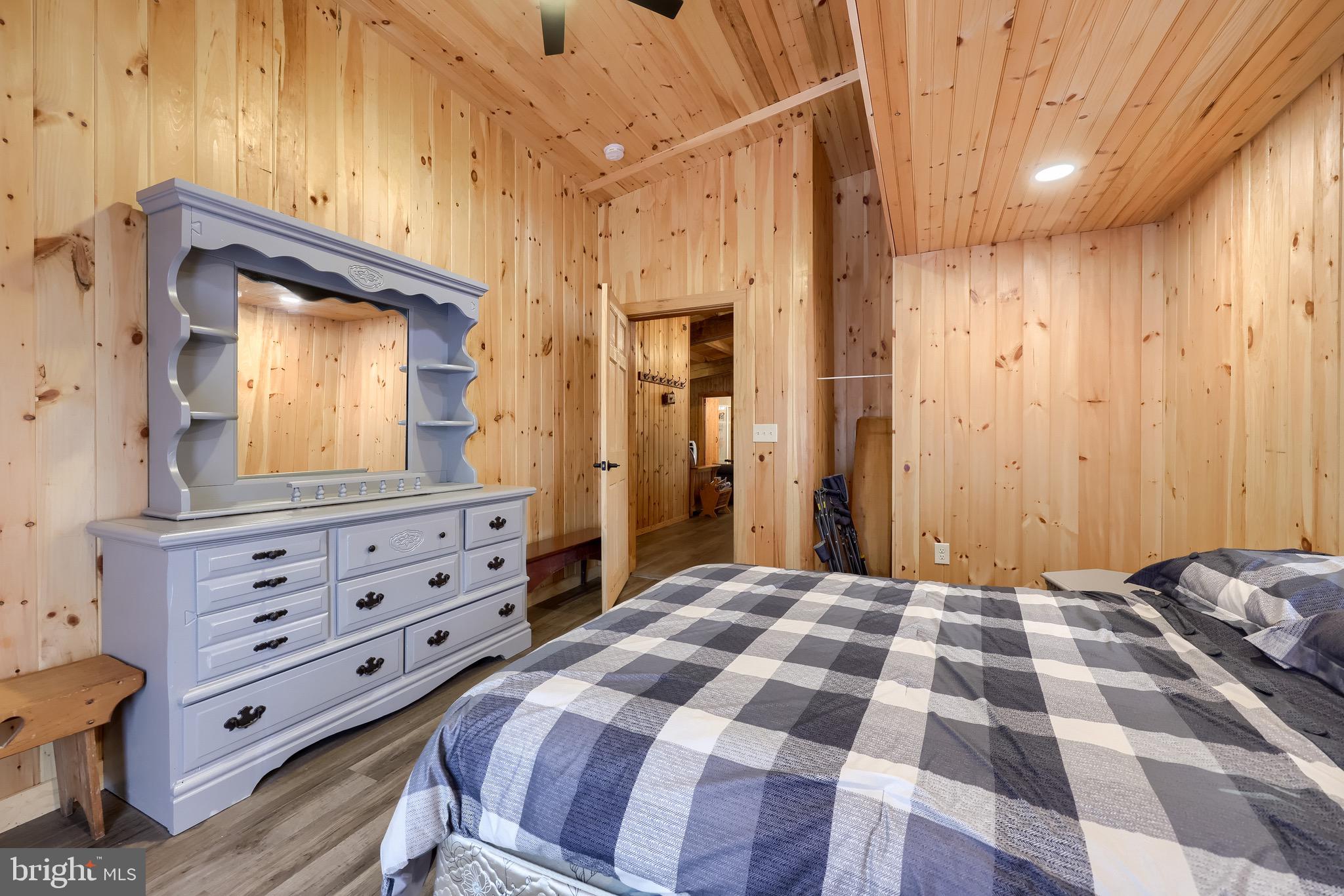 485 Airport Road Bethel, PA 19507 - Photo 28 of 71 a bedroom with a bed and a dresser