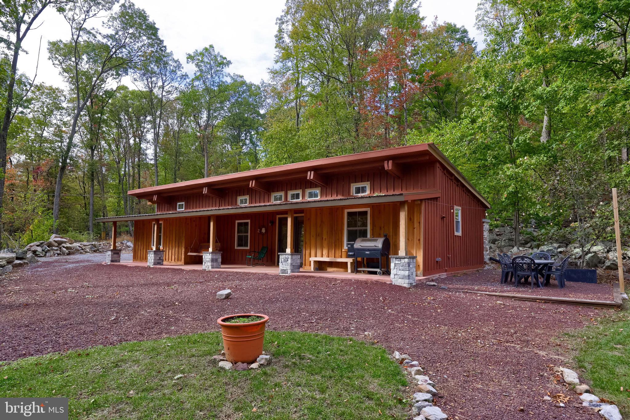 485 Airport Road Bethel, PA 19507 - Photo 3 of 71 a front view of a house with a yard