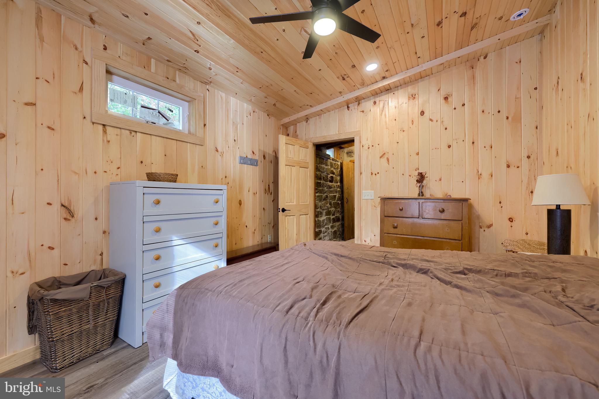 485 Airport Road Bethel, PA 19507 - Photo 32 of 71 a bedroom with a bed and furniture