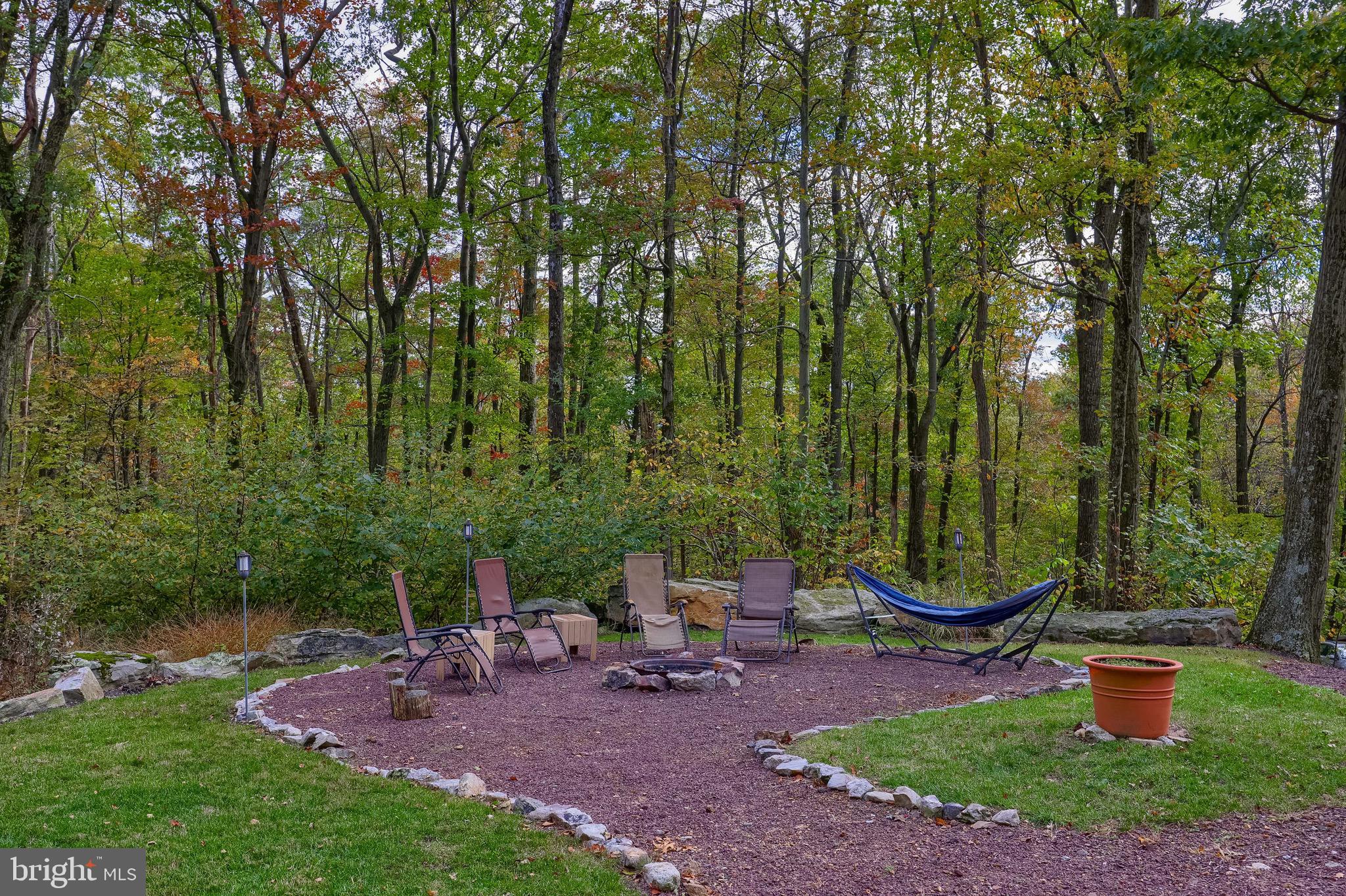 485 Airport Road Bethel, PA 19507 - Photo 41 of 71 a view of a patio with chairs and plants