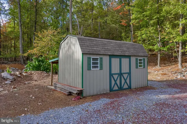a front view of a house with swimming pool