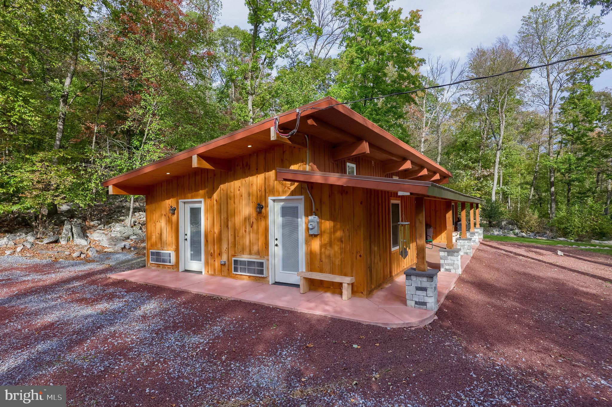 485 Airport Road Bethel, PA 19507 - Photo 45 of 71 a front view of a house with a yard