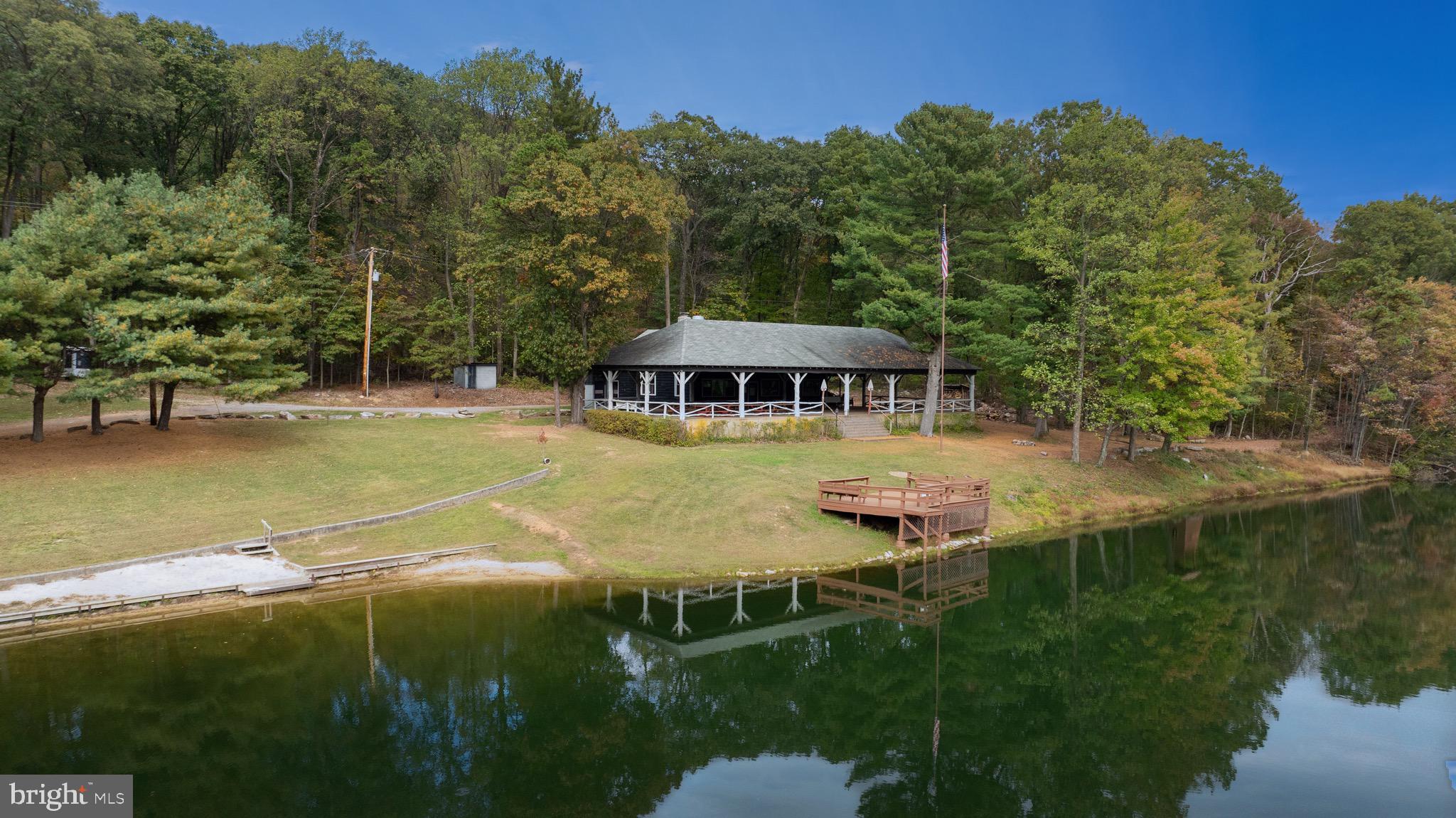 485 Airport Road Bethel, PA 19507 - Photo 57 of 71 a view of a swimming pool with lounge chair