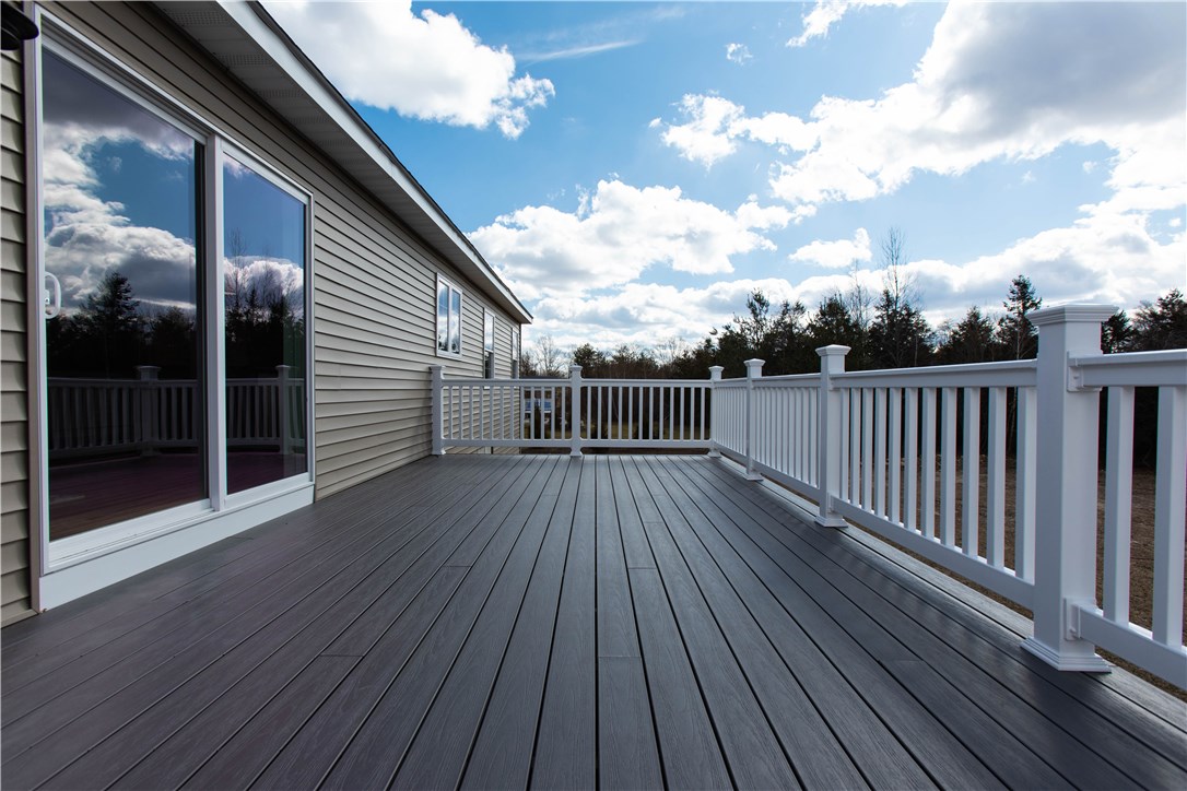 1331 Pippin Orchard Road Cranston, RI 02921 - Photo 3 of 27 Maintenance Free Deck overlooking private backyard