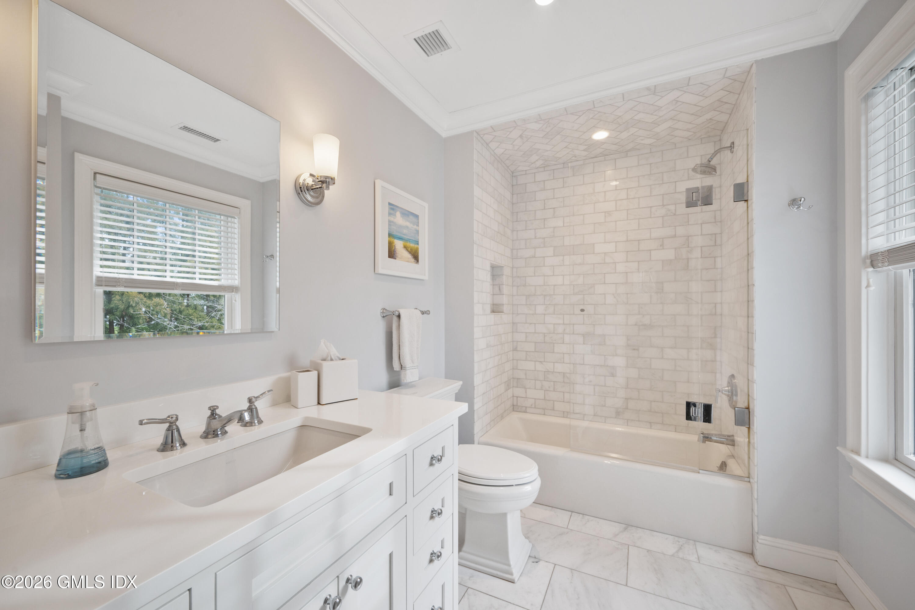 15 Pell Place Riverside, CT 06878 - Photo 23 of 35 a bathroom with a bathtub shower sink vanity mirror and toilet