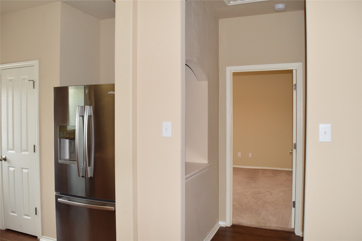 11717 Alexs Lane Austin, TX 78748 - Photo 9 of 32 a room with wooden floor and closet