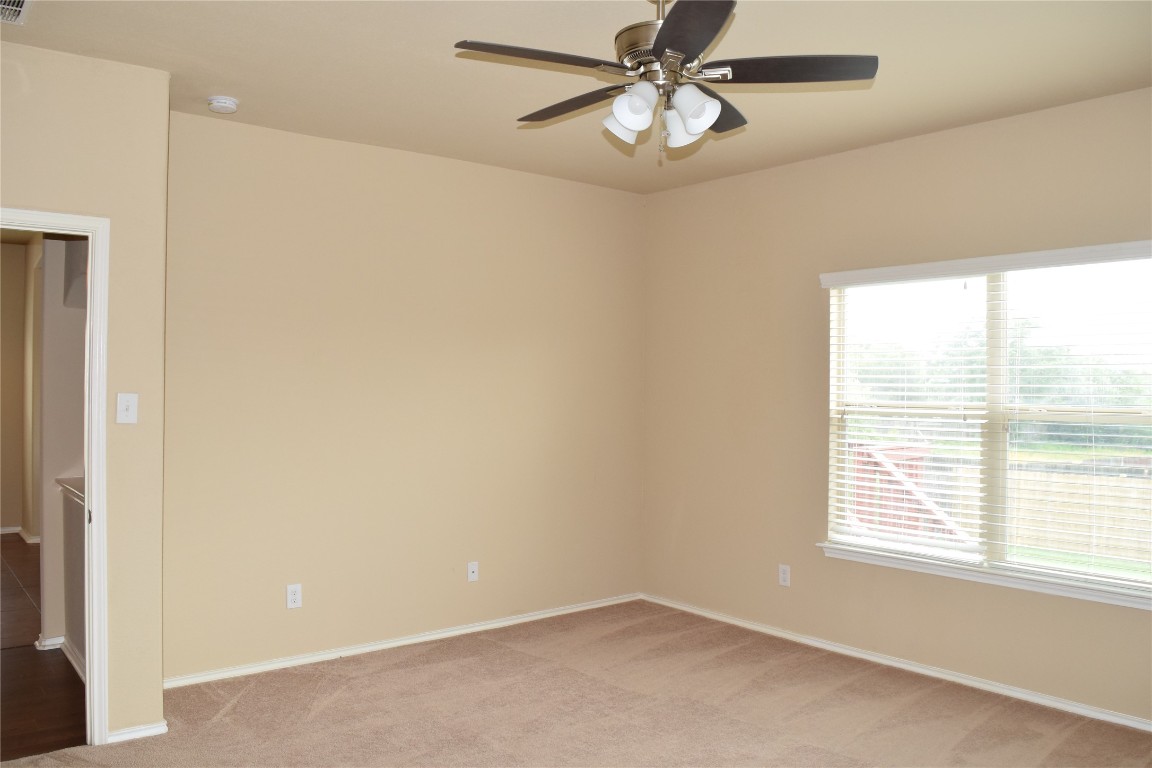 11717 Alexs Lane Austin, TX 78748 - Photo 10 of 32 a view of an empty room with a window