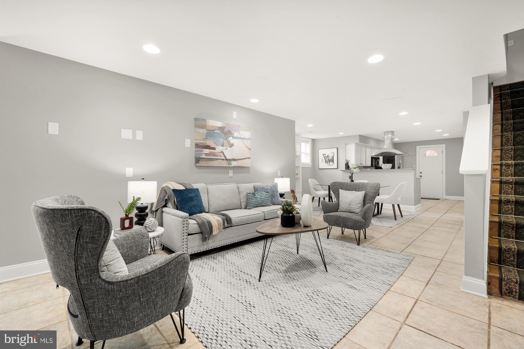 1819 1st Street Northwest, Unit A Washington, DC 20001 - Photo 37 of 38 a living room with furniture and a painting