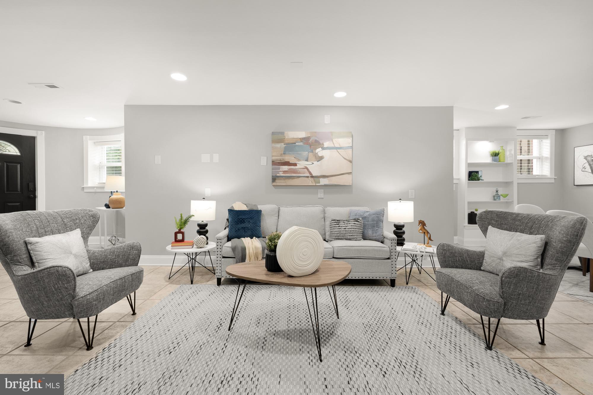 1819 1st Street Northwest, Unit A Washington, DC 20001 - Photo 38 of 38 a living room with furniture and wooden floor