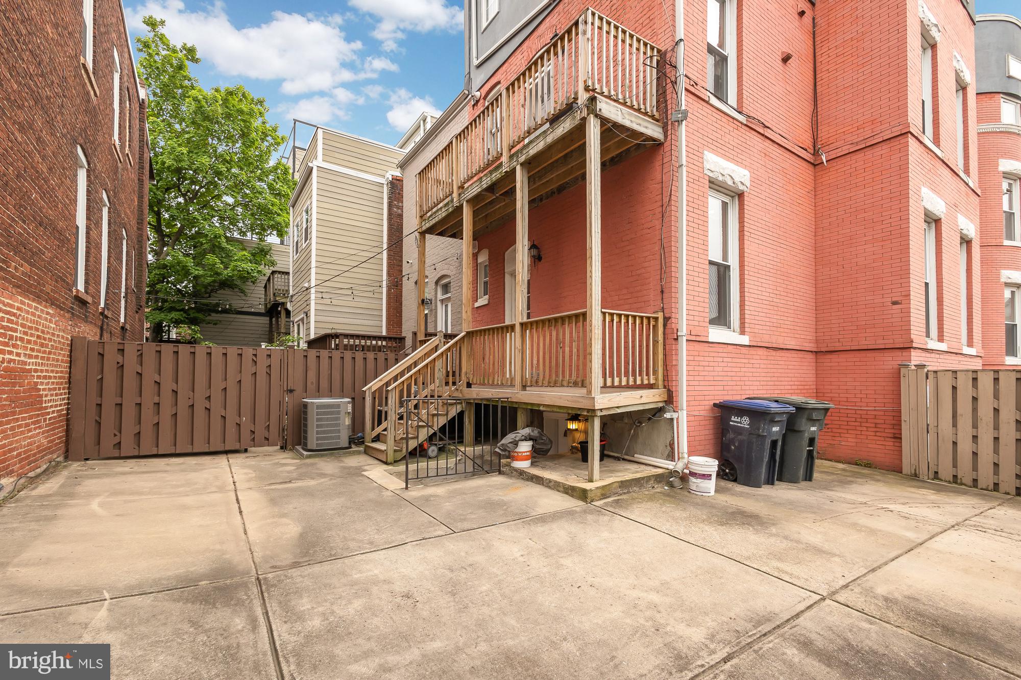 1819 1st Street Northwest, Unit A Washington, DC 20001 - Photo 7 of 38 a view of a wooden house with large windows