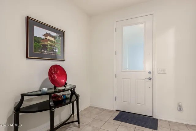 a view of room with window and cabinet