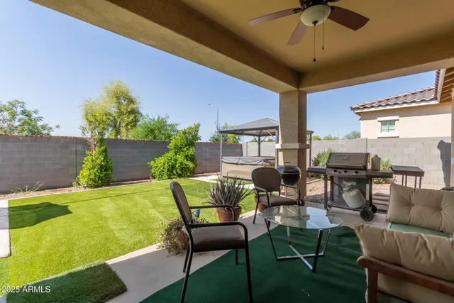 a view of an swimming pool with seating space