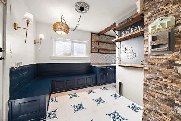 a bathroom with a bathtub and shower