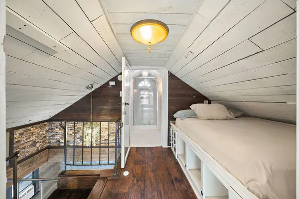a view of sitting area with wooden floor