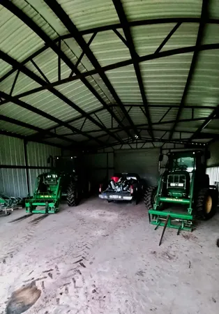 a view of a garage with a table and a chairs