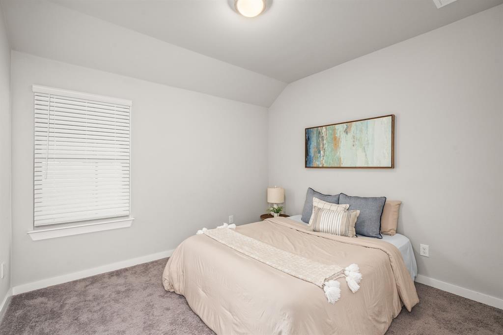 4017 Mapleleaf Pass Melissa, TX 75454 - Photo 23 of 32 a bedroom with a bed and a window
