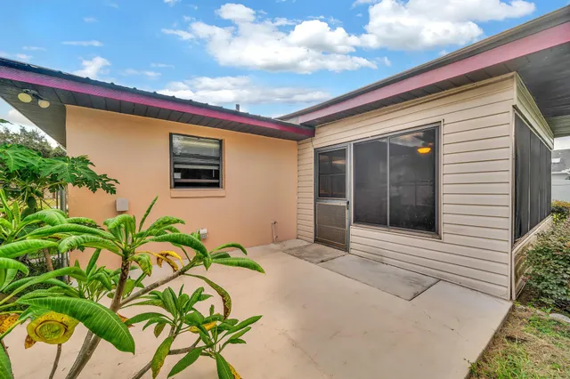 a view of a entryway door front of house